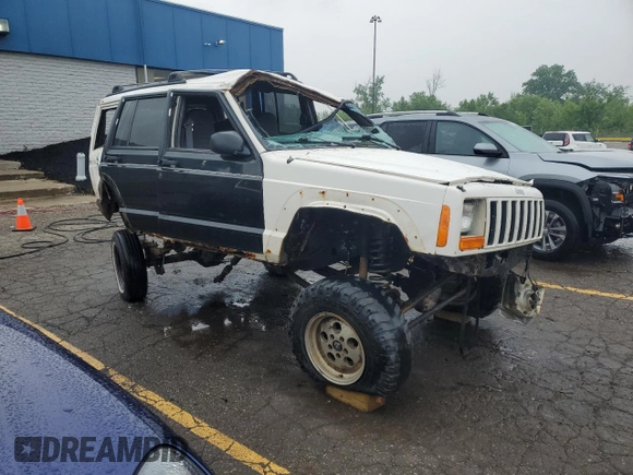 2001 Jeep Cherokee Sport with VIN 1J4FF48S41L611052, listed as a Copart auction lot 59667135 with 270,448 mi miles and Clean title. Bid and sale history available at DreamBid. Image 4.