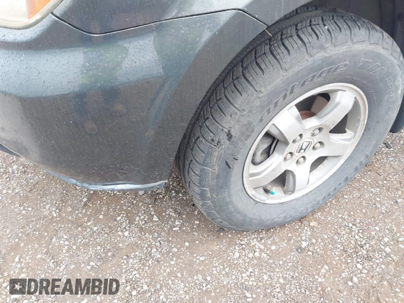 2006 Honda Pilot EX with VIN 2HKYF18426H502390, listed as a IAAI auction lot 42146354 with 164,937 mi miles and . Bid and sale history available at DreamBid. Image 6.