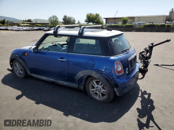 2012 MINI Hardtop with VIN WMWSU3C53CT257126, listed as a Copart auction lot 52146465 with 146,485 mi miles and Salvage Title. Bid and sale history available at DreamBid. Image 2.