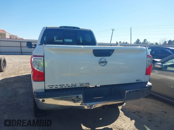 2016 Nissan Titan SL z VIN 1N6BA1F21GN504118, wystawiony jako IAAI lot #41729710 z przebiegiem 127 760 mil mil oraz . Historia ofert i sprzedaży dostępna na DreamBid. Obrazek 15.