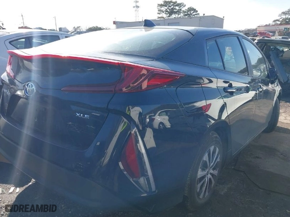 2021 Toyota Prius Prime LE with VIN JTDKAMFP6M3174161, listed as a IAAI auction lot 41449726 with 20,667 mi miles. Bid and sale history available at carsss.com. Image 4.