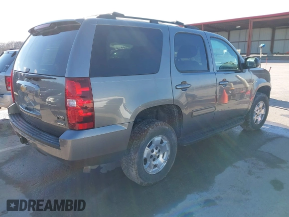 2012 Chevrolet Tahoe LS with VIN 1GNSKAE05CR278255, listed as a IAAI auction lot 41054601 with 205,470 mi miles and . Bid and sale history available at DreamBid. Image 4.