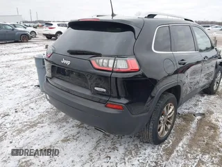 2019 Jeep Cherokee Altitude with VIN 1C4PJMLN3KD150464, listed as a IAAI auction lot 41192357 with 144,734 mi miles and . Bid and sale history available at DreamBid. Image 4.