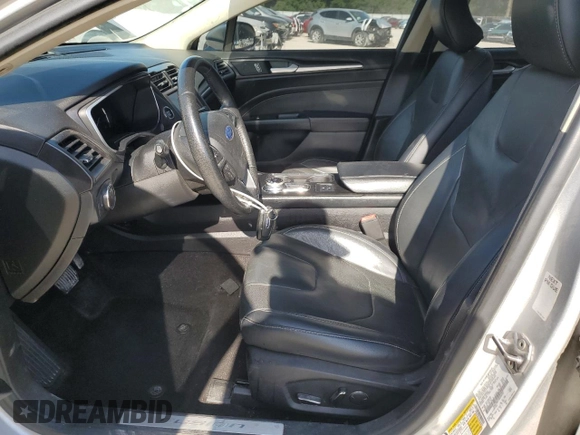 2019 Ford Fusion Titanium with VIN 3FA6P0RU1KR209297, listed as a Copart auction lot 54358065 with 122,600 mi miles and Salvage Title. Bid and sale history available at DreamBid. Image 7.
