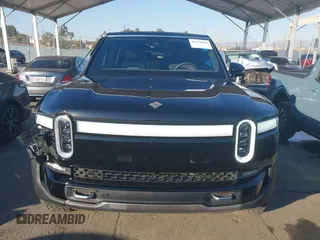 2024 Rivian R1S Adventure with VIN 7PDSGABAXRN034598, listed as a IAAI auction lot 41312180 with 23,615 mi miles. Bid and sale history available at carsss.com. Image 13.
