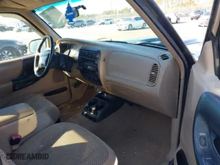 1999 Ford Ranger XL with VIN 1FTYR14X6XTA83979, listed as a IAAI auction lot 41355593 with 201,284 mi miles. Bid and sale history available at carsss.com. Image 5.