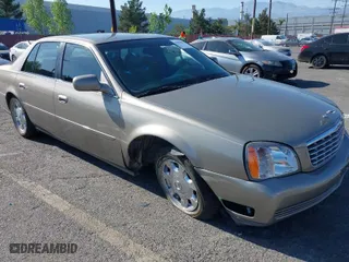 2002 Cadillac DeVille with VIN 1G6KD54Y22U257279, listed as a IAAI auction lot 41989851 with 136,432 mi miles. Bid and sale history available at carsss.com. Image 6.