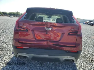 2020 Cadillac XT4 FWD Premium Luxury with VIN 1GYFZCR47LF040062, listed as a Copart auction lot 52309415 with 12,517 mi miles and Salvage title. Bid and sale history available at DreamBid. Image 6.