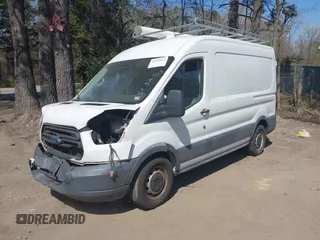 2016 Ford Transit Cargo with VIN 1FTYE1CM1GKA17395, listed as a IAAI auction lot 41892013 with 188,016 mi miles. Bid and sale history available at carsss.com. Image 2.