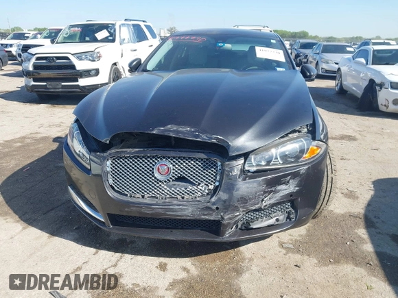 2015 Jaguar XF T Premium with VIN SAJWA0FS0FPU43248, listed as a IAAI auction lot 41977730 with 105,086 mi miles and . Bid and sale history available at DreamBid. Image 6.