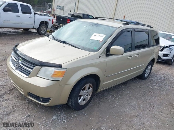 2010 Dodge Grand Caravan SXT with VIN 2D4RN5DX5AR290131, listed as a IAAI auction lot 41314452 with 194,819 mi miles. Bid and sale history available at carsss.com. Image 2.