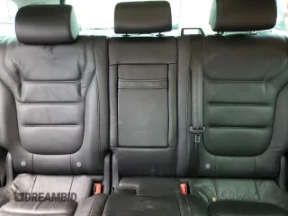 2013 Volkswagen Touareg Exec z VIN WVGEF9BP6DD011274, wystawiony jako Copart lot #50680105 z przebiegiem 96 336 mil mil oraz Szkody całkowita. Historia ofert i sprzedaży dostępna na DreamBid. Obrazek 10.