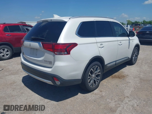 2017 Mitsubishi Outlander GT with VIN JA4JZ4AX1HZ023740, listed as a IAAI auction lot 42052468 with 106,073 mi miles and . Bid and sale history available at DreamBid. Image 4.