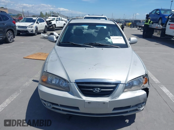 2004 Hyundai Elantra GLS z VIN KMHDN46D74U781436, wystawiony jako IAAI lot #42260519 z przebiegiem 132 943 mil mil oraz . Historia ofert i sprzedaży dostępna na DreamBid. Obrazek 12.