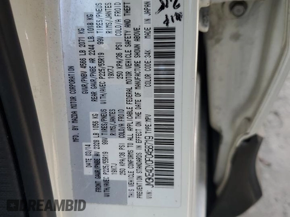 2015 Mazda CX-5 Grand Touring with VIN JM3KE4DY0F0458719, listed as a Copart auction lot 52960365 with 128,372 mi miles and Salvage Title. Bid and sale history available at DreamBid. Image 13.
