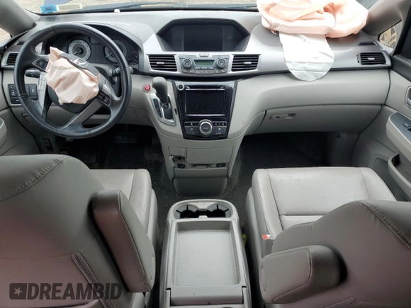 2014 Honda Odyssey EX-L with VIN 5FNRL5H61EB015958, listed as a Copart auction lot 62747765 with Not provided miles and Salvage title. Bid and sale history available at DreamBid. Image 8.