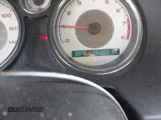2009 Pontiac G5 with VIN 1G2AS18H097148690, listed as a IAAI auction lot 41801507 with 156,328 mi miles. Bid and sale history available at carsss.com. Image 7.