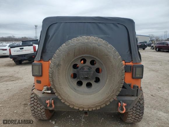 2012 Jeep Wrangler JK Sport S with VIN 1C4GJWAG6CL227139, listed as a Copart auction lot 44497345 with 77,928 mi miles and Salvage Title. Bid and sale history available at carsss.com. Image 6.