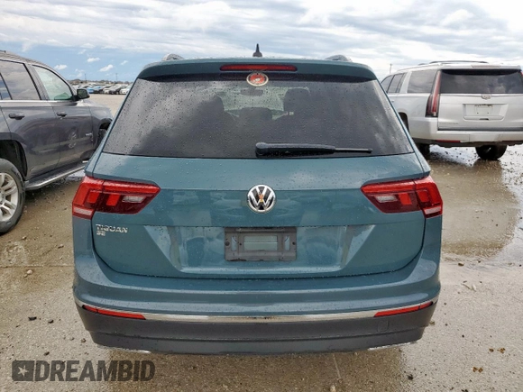 2021 Volkswagen Tiguan SE z VIN 3VV3B7AX9MM066823, wystawiony jako Copart lot #55422685 z przebiegiem 103 524 mil mil oraz Szkoda całkowita • Salvage title. Historia ofert i sprzedaży dostępna na DreamBid. Obrazek 6.