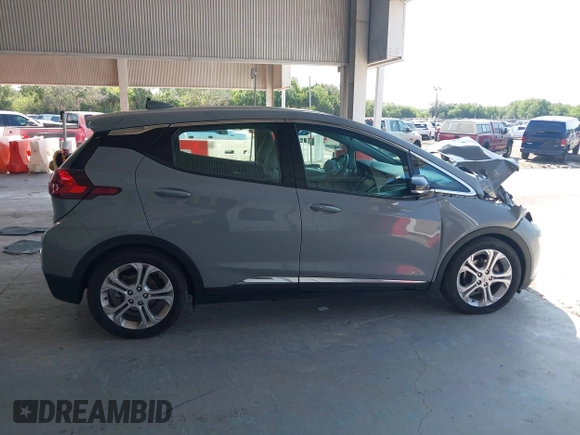 2020 Chevrolet Bolt EV LT z VIN 1G1FY6S01L4109222, wystawiony jako IAAI lot #42231173 z przebiegiem 43 570 mil mil oraz . Historia ofert i sprzedaży dostępna na DreamBid. Obrazek 13.