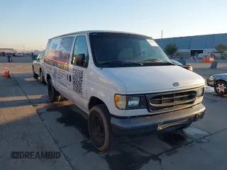 1999 Ford E-Series Commercial z VIN 1FTPE2423XHA54251, wystawiony jako IAAI lot #41038213 z przebiegiem 229 554 mil mil oraz . Historia ofert i sprzedaży dostępna na DreamBid. Obrazek 1.