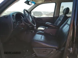2008 Chevrolet TrailBlazer 1LT with VIN 1GNDT13S982246404, listed as a Copart auction lot 71012014 with 239,388 mi miles and Salvage Title. Bid and sale history available at DreamBid. Image 7.