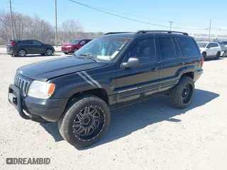 2002 Jeep Grand Cherokee Limited with VIN 1J4GW58N62C308103, listed as a IAAI auction lot 41760396 with 247,152 mi miles. Bid and sale history available at carsss.com. Image 2.