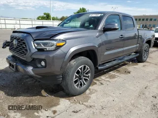 2021 Toyota Tacoma SR5 z VIN 5TFDZ5BNXMX057980, wystawiony jako Copart lot #58177465 z przebiegiem 43 994 mil mil oraz Szkoda całkowita • Salvage title. Historia ofert i sprzedaży dostępna na DreamBid. Obrazek 1.