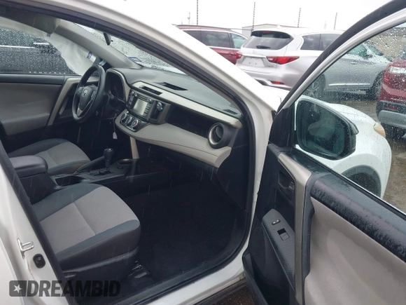2014 Toyota RAV4 LE with VIN 2T3ZFREV0EW107096, listed as a IAAI auction lot 42627066 with 132,349 mi miles and . Bid and sale history available at DreamBid. Image 5.