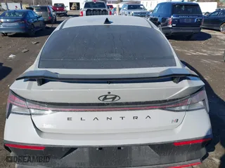 2025 Hyundai Elantra N with VIN KMHLW4DK9SU023797, listed as a IAAI auction lot 41433306 with 2,019 mi miles. Bid and sale history available at carsss.com. Image 16.