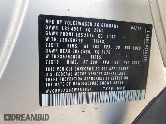 2011 Volkswagen Tiguan SEL z VIN WVGBV7AX6BW559854, wystawiony jako Copart lot #56268195 z przebiegiem 107 428 mil mil oraz Czysty tytuł • Clean title. Historia ofert i sprzedaży dostępna na DreamBid. Obrazek 13.