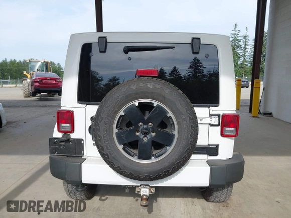 2012 Jeep Wrangler Unlimited Sahara with VIN 1C4BJWEG7CL275883, listed as a IAAI auction lot 42510764 with 149,531 mi miles and . Bid and sale history available at DreamBid. Image 17.