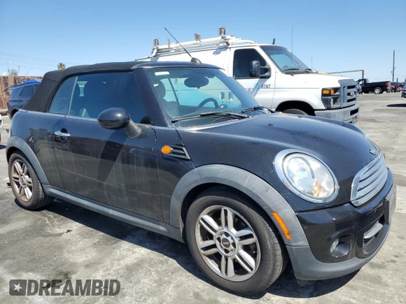2015 MINI Convertible with VIN WMWZN3C56FT266838, listed as a Copart auction lot 50250745 with 60,331 mi miles and Salvage title. Bid and sale history available at DreamBid. Image 4.