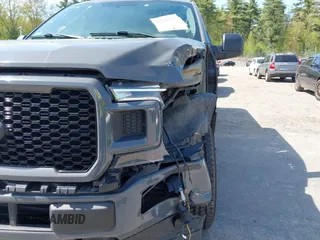2018 Ford F-150 XL with VIN 1FTEW1EP6JFE00496, listed as a IAAI auction lot 42247235 with 76,858 mi miles and . Bid and sale history available at DreamBid. Image 18.