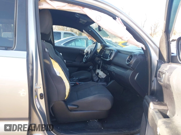 2018 Toyota Tacoma SR with VIN 5TFCZ5AN3JX151479, listed as a IAAI auction lot 41428376 with 104,717 mi miles. Bid and sale history available at carsss.com. Image 5.