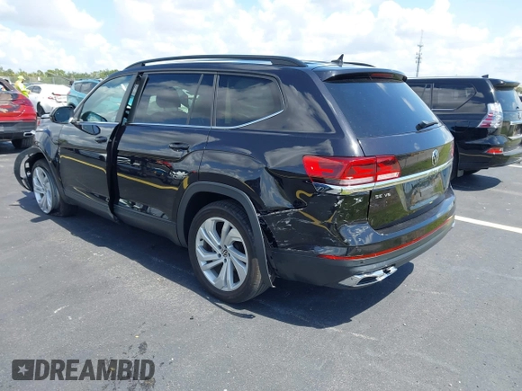2021 Volkswagen Atlas SE with VIN 1V2WR2CA1MC607768, listed as a IAAI auction lot 42518885 with 49,286 mi miles and . Bid and sale history available at DreamBid. Image 3.