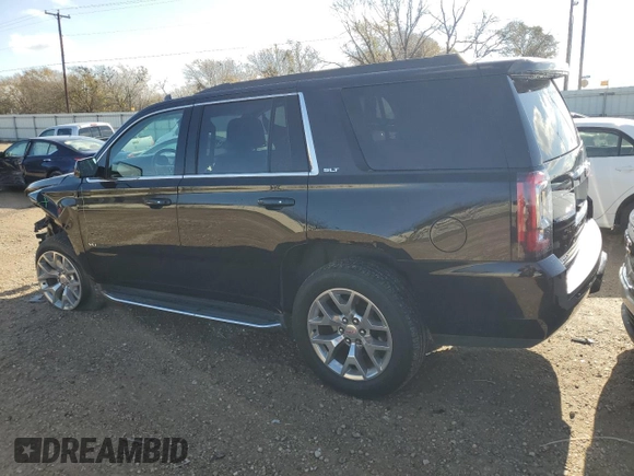 2019 GMC Yukon SLT with VIN 1GKS1BKC0KR321175, listed as a Copart auction lot 84092224 with 99,711 mi miles and Salvage Title. Bid and sale history available at carsss.com. Image 2.