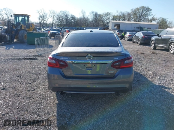 2018 Nissan Altima 2.5 SR with VIN 1N4AL3AP7JC240029, listed as a IAAI auction lot 41883209 with 77,190 mi miles. Bid and sale history available at carsss.com. Image 16.