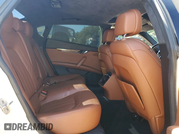 2017 Maserati Quattroporte z VIN ZAM56RRL1H1230279, wystawiony jako Copart lot #67067924 z przebiegiem Nie podano mil oraz Czysty tytuł • Clean title. Historia ofert i sprzedaży dostępna na DreamBid. Obrazek 10.