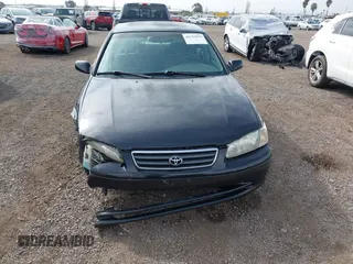 2001 Toyota Camry CE with VIN JT2BG22K910548345, listed as a IAAI auction lot 41723835 with 170,228 mi miles and . Bid and sale history available at DreamBid. Image 13.