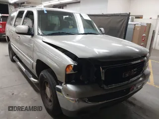 2004 GMC Yukon XL SLE with VIN 3GKEC16T14G149236, listed as a IAAI auction lot 41550083 with 165,759 mi miles. Bid and sale history available at carsss.com. Image 1.