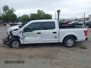 2019 Ford F-150 XL with VIN 1FTEW1CB3KKE51647, listed as a IAAI auction lot 42022111 with 59,344 mi miles and . Bid and sale history available at DreamBid. Image 14.