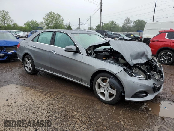 2014 Mercedes-Benz E 350 Luxury with VIN WDDHF8JB1EB014135, listed as a Copart auction lot 56395215 with Not provided miles and Salvage title. Bid and sale history available at DreamBid. Image 4.