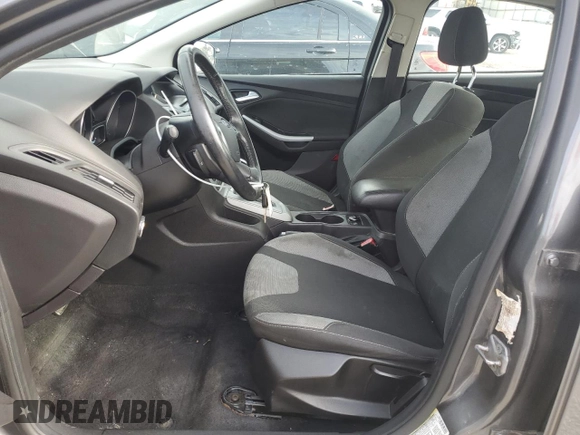 2012 Ford Focus SE with VIN 1FAHP3F27CL335046, listed as a Copart auction lot 55235175 with 128,119 mi miles and Salvage title. Bid and sale history available at DreamBid. Image 7.
