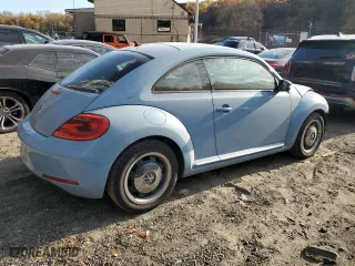 2012 Volkswagen Beetle 2.5L w/Sun PZEV with VIN 3VWJP7AT7CM617198, listed as a Copart auction lot 77875314 with 60,969 mi miles and Salvage Title. Bid and sale history available at carsss.com. Image 3.