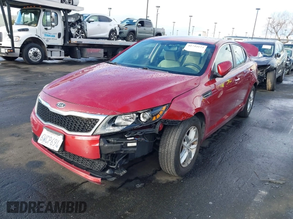 2012 Kia Optima LX with VIN 5XXGM4A70CG070980, listed as a IAAI auction lot 41744124 with 158,355 mi miles and . Bid and sale history available at carsss.com. Image 2.