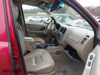 2005 Ford Escape Limited with VIN 1FMYU04155KA77626, listed as a IAAI auction lot 41368626 with 215,182 mi miles. Bid and sale history available at carsss.com. Image 5.