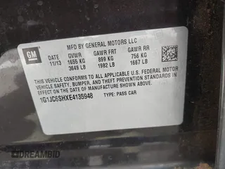 2014 Chevrolet Sonic LT with VIN 1G1JC6SHXE4135948, listed as a IAAI auction lot 41949833 with 127,202 mi miles. Bid and sale history available at carsss.com. Image 9.