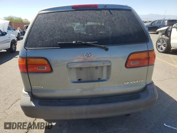 2000 Toyota Sienna CE with VIN 4T3GF19C9YU272554, listed as a Copart auction lot 73125134 with 240,998 mi miles and Salvage Title. Bid and sale history available at carsss.com. Image 6.
