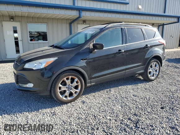 2014 Ford Escape SE with VIN 1FMCU0GX7EUB42975, listed as a Copart auction lot 52605765 with 138,523 mi miles and Salvage Title. Bid and sale history available at DreamBid. Image 1.